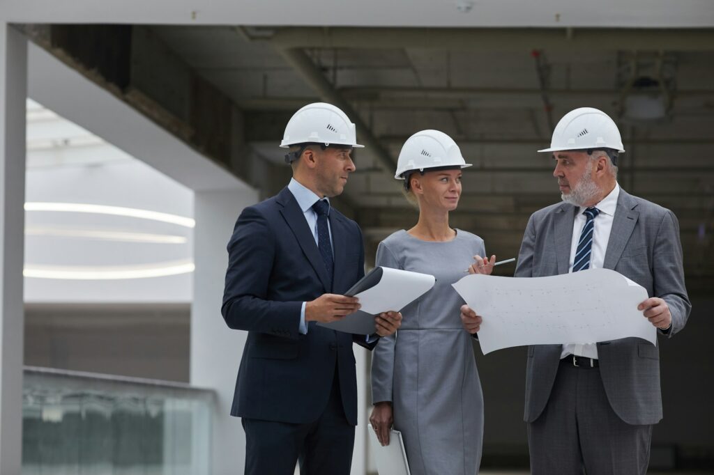 Management Discussing Construction on Site