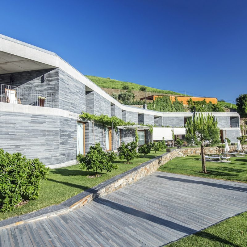 Modern hotel and wooden walkway